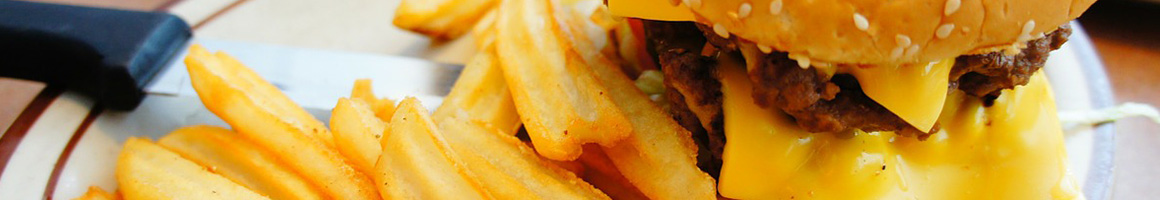 Eating Burger at Jim's Burger Haven restaurant in Thornton, CO.